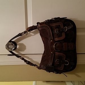 Brown Coach vintage logo bag.